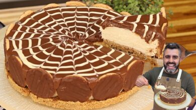 Torta holandesa com camada cremosa de chocolate branco e cobertura de ganache