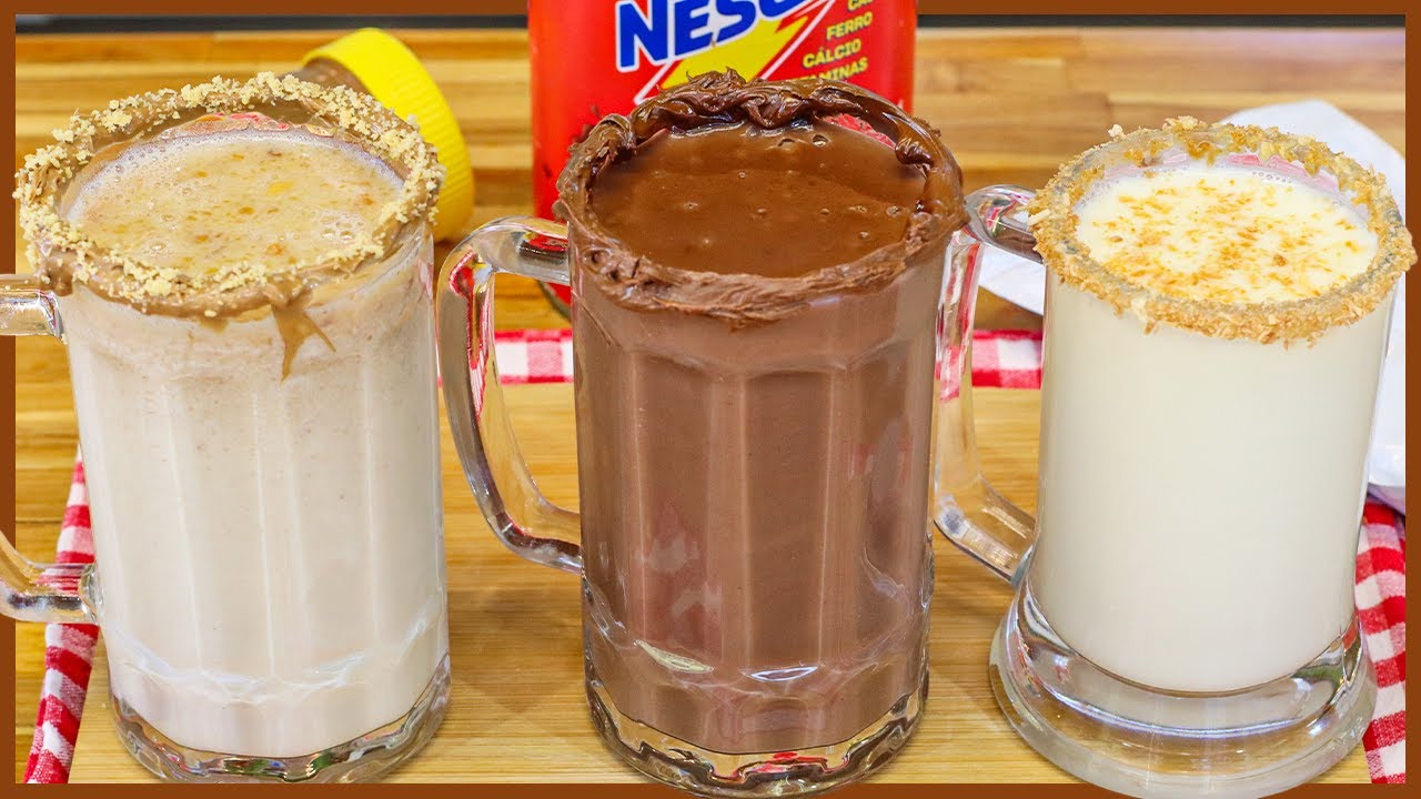 Três copos com bebidas quentes: chá de amendoim, coco quente e chocolate quente